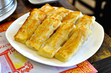 锅贴最新，美食文化的演变与观点碰撞的探讨